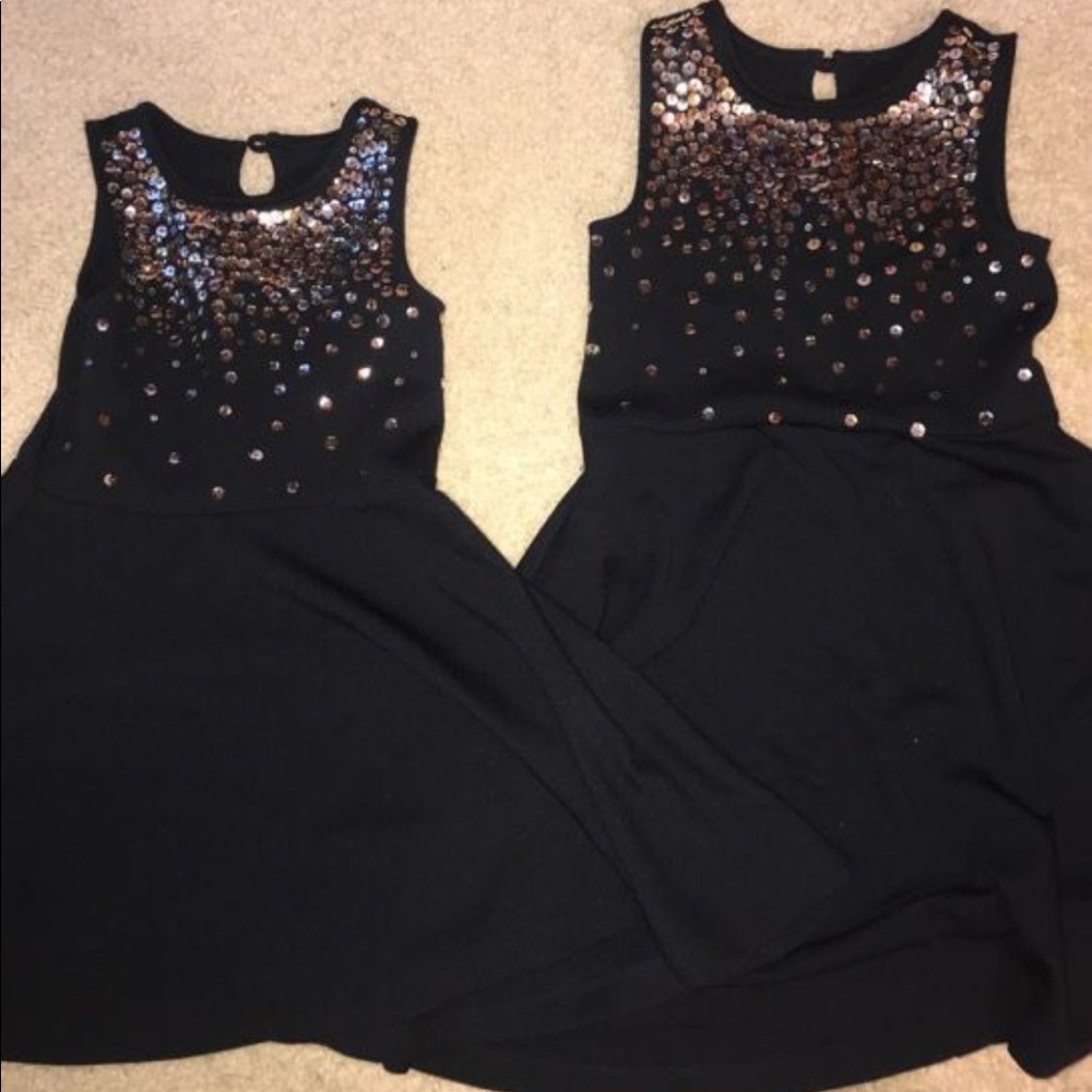 Size 4 and size 5-6 Lands End holiday dresses